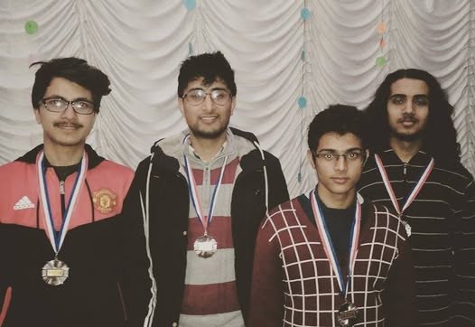 Deep Shankar Pandey and teammates wearing medals in a 2016 group photo